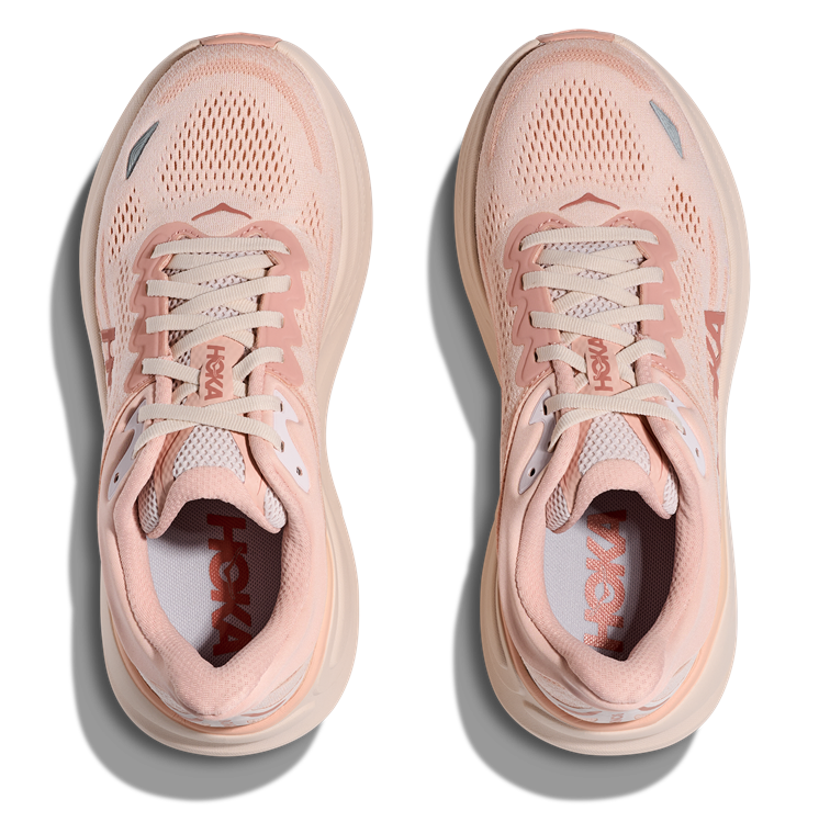HOKA Bondi 9 Damen-Laufschuh in Rosa-Beige mit maximaler Dämpfung und atmungsaktivem Mesh-Obermaterial.